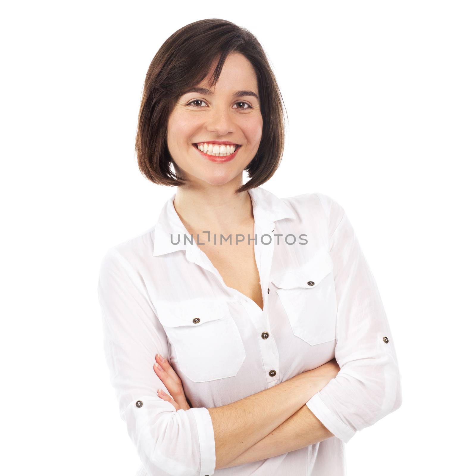 Portrait of a young woman smiling, with her arms crossed, isolated on white