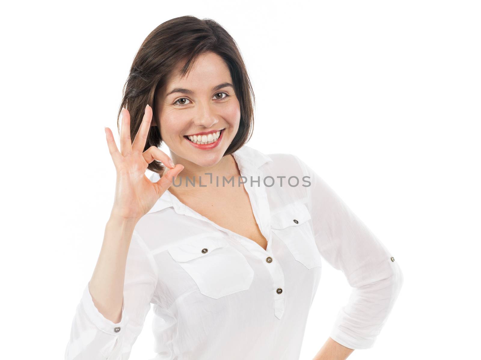 Portrait of confident woman having a successful gesture, isolated on white