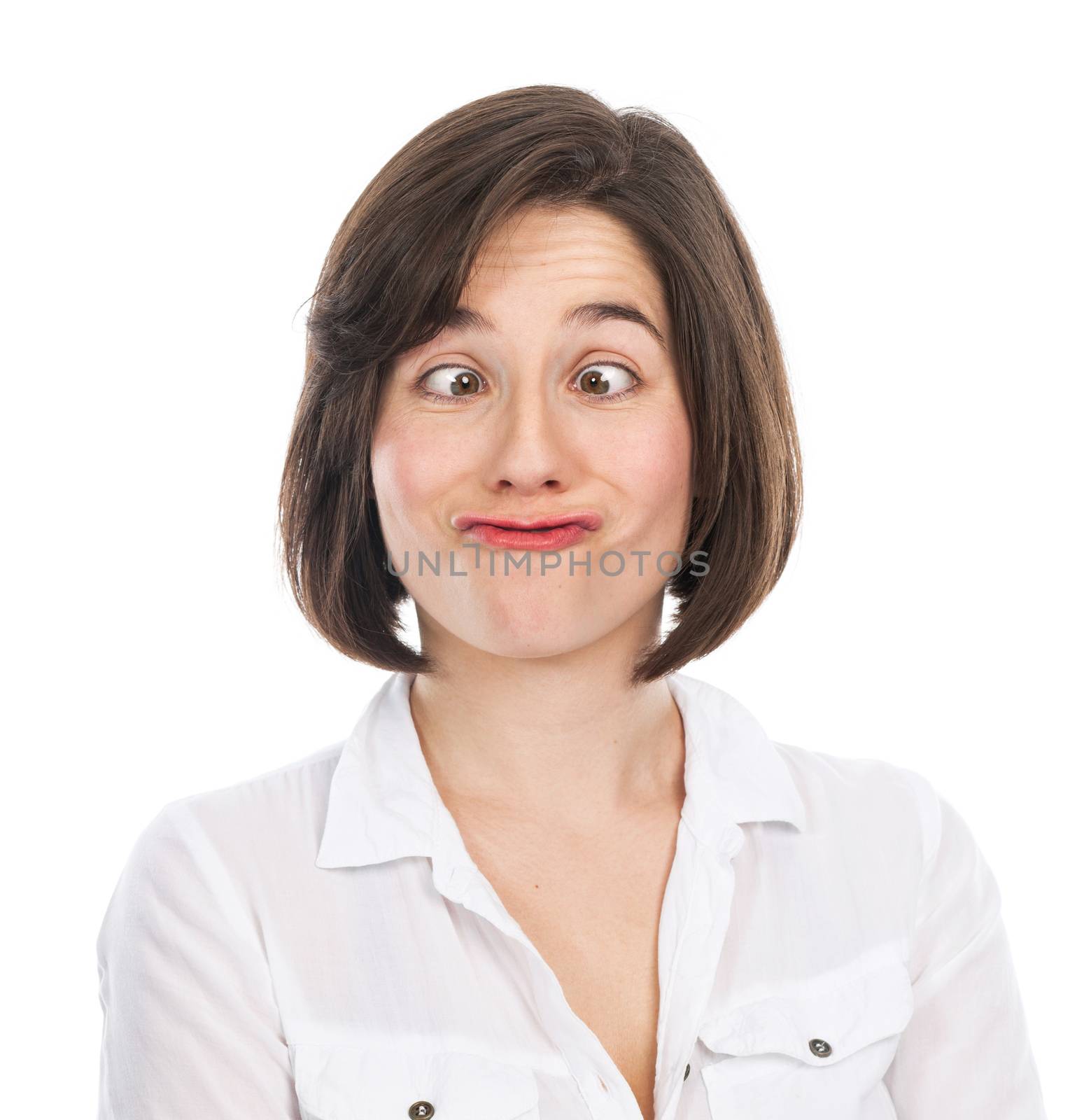 Portrait of a funny girl having a funny face, isolated on white