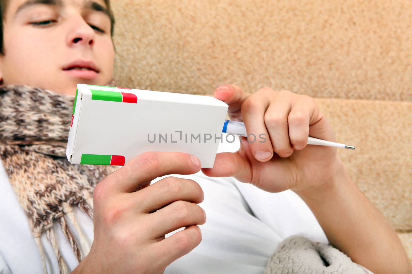 Sick Teenager looking on Drug Box by sabphoto