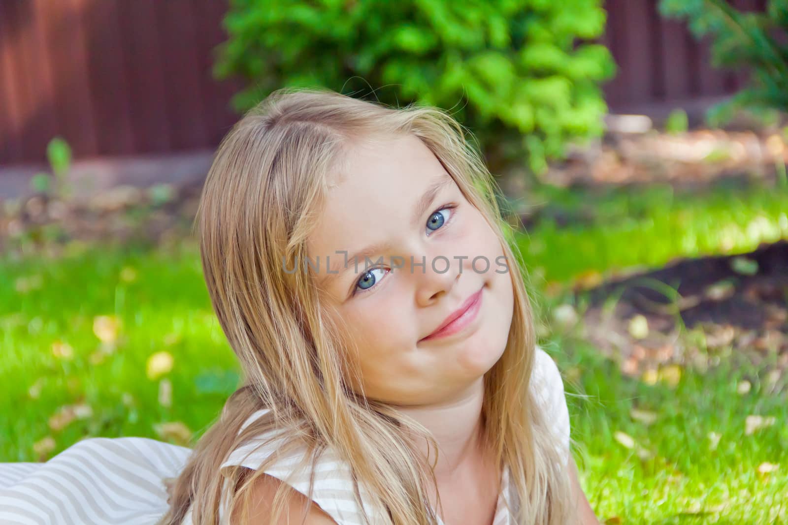 Photo of cute girl with big blue eyes