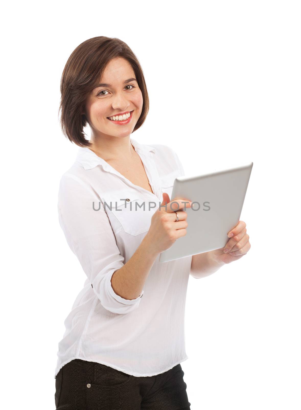 Young smiling brunette holding an electronic tablet, isolated on white