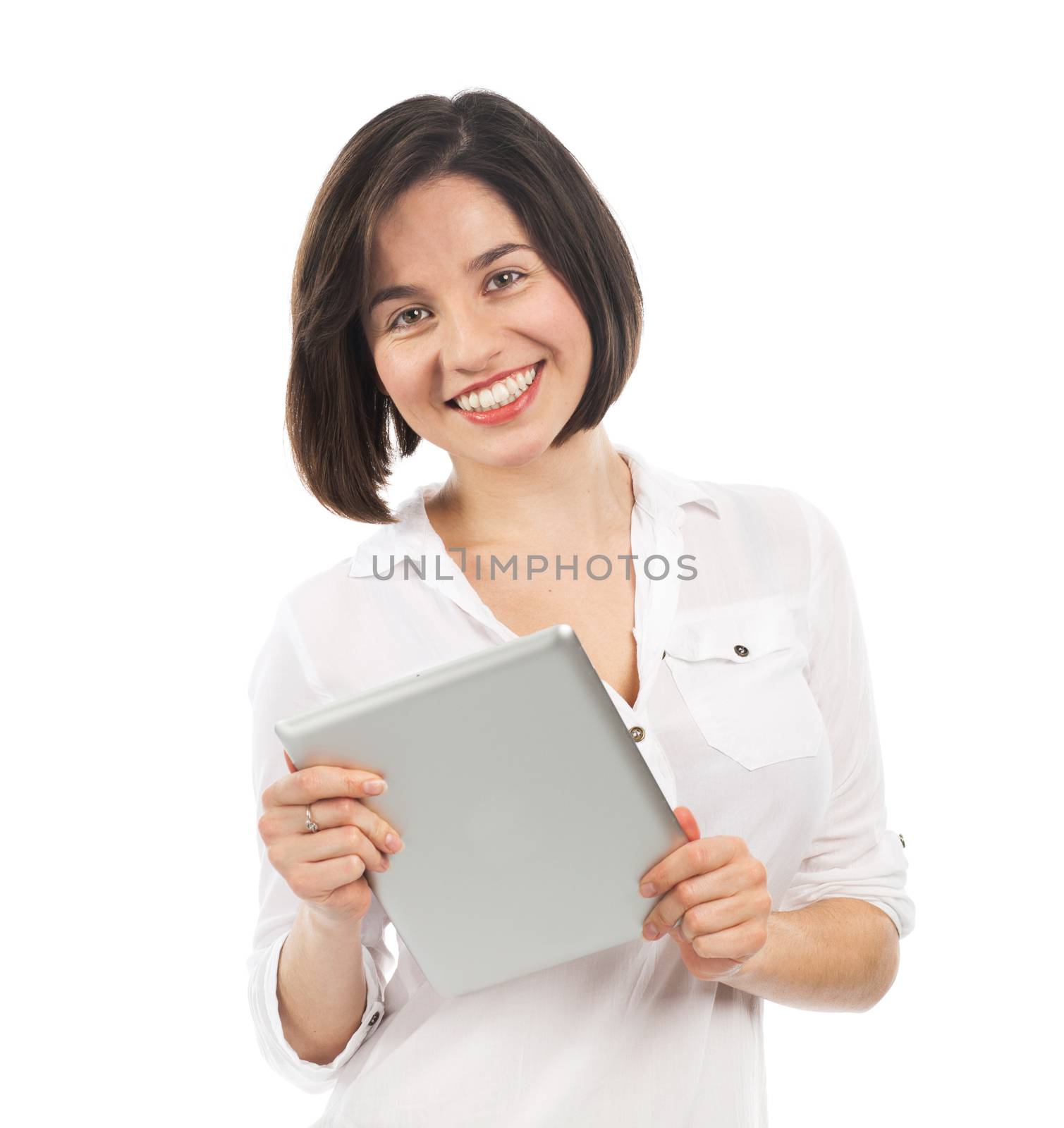 Young smiling woman using an electronic tablet, isolated on white