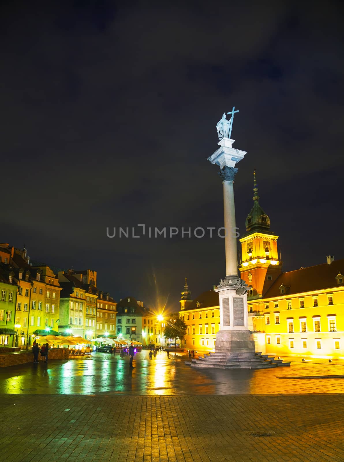 WARSAW - OCTOBER 1: Castle square at night on October 1, 2014 in Warsaw, Poland. It's a historic square in front of the Royal Castle the former official residence of Polish monarchs.