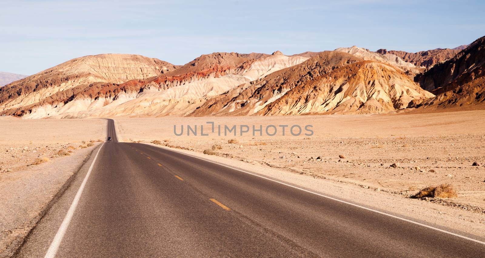 Lonely Car Long Highway Badwater Basin Death Valley by ChrisBoswell