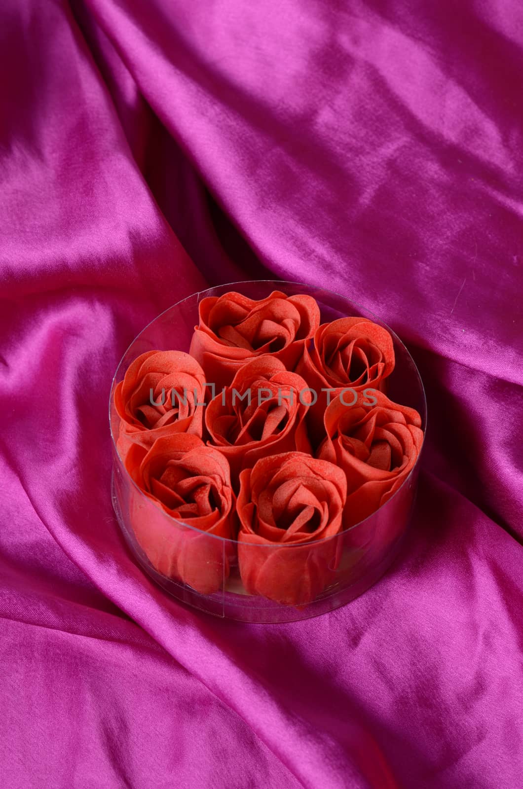 soap roses on the pink satin