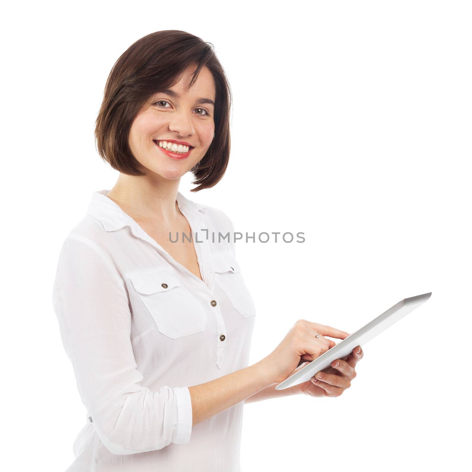 Young smiling woman using a touchpad, isolated on white