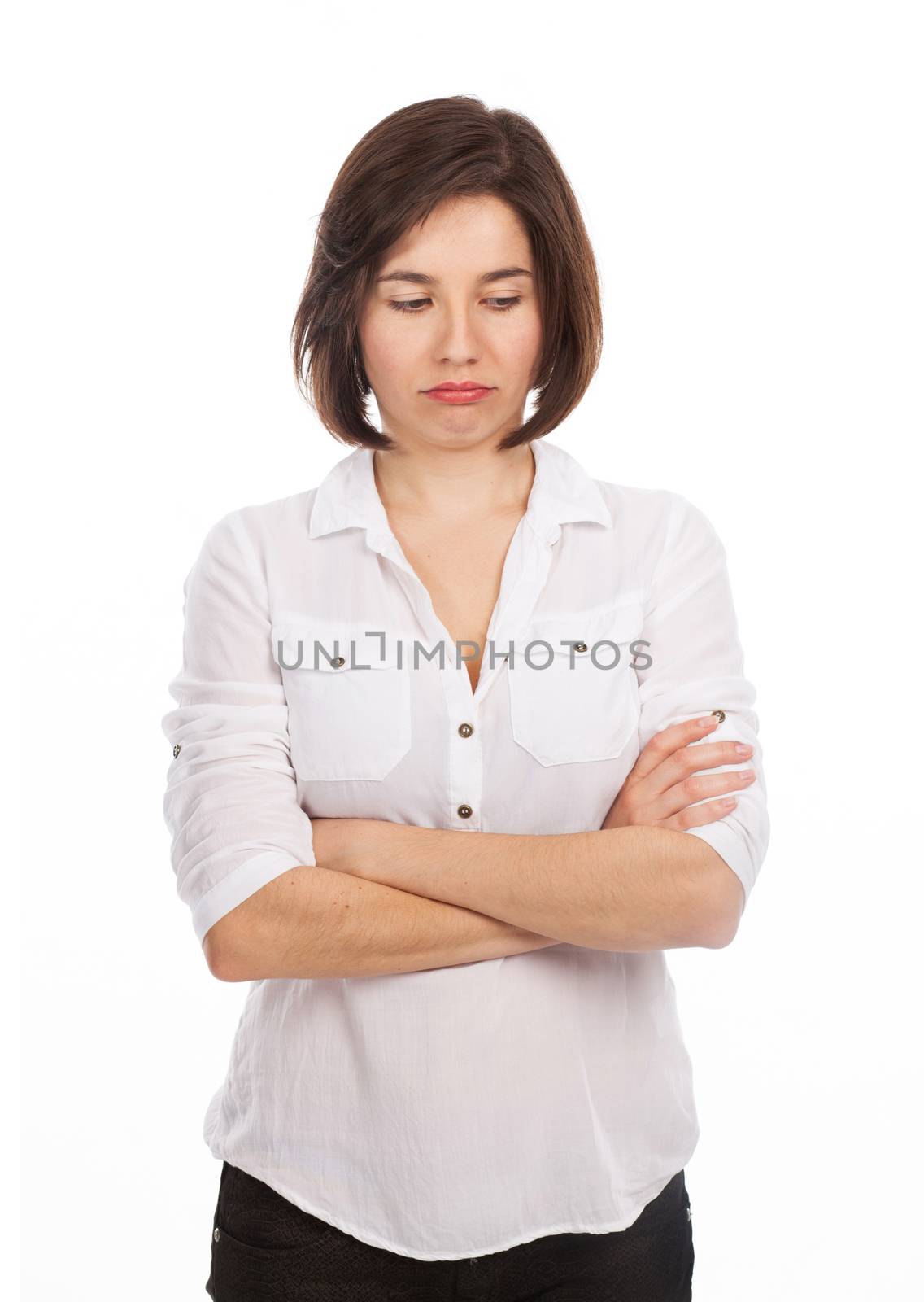 Portrait of a young woman looking sad, isolated on white