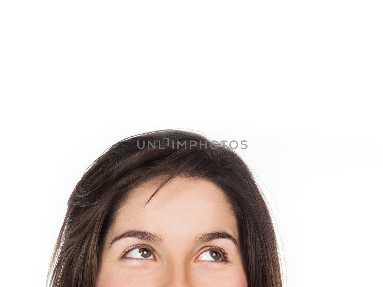 Close-up view of eyes looking up, copy space, isolated on white