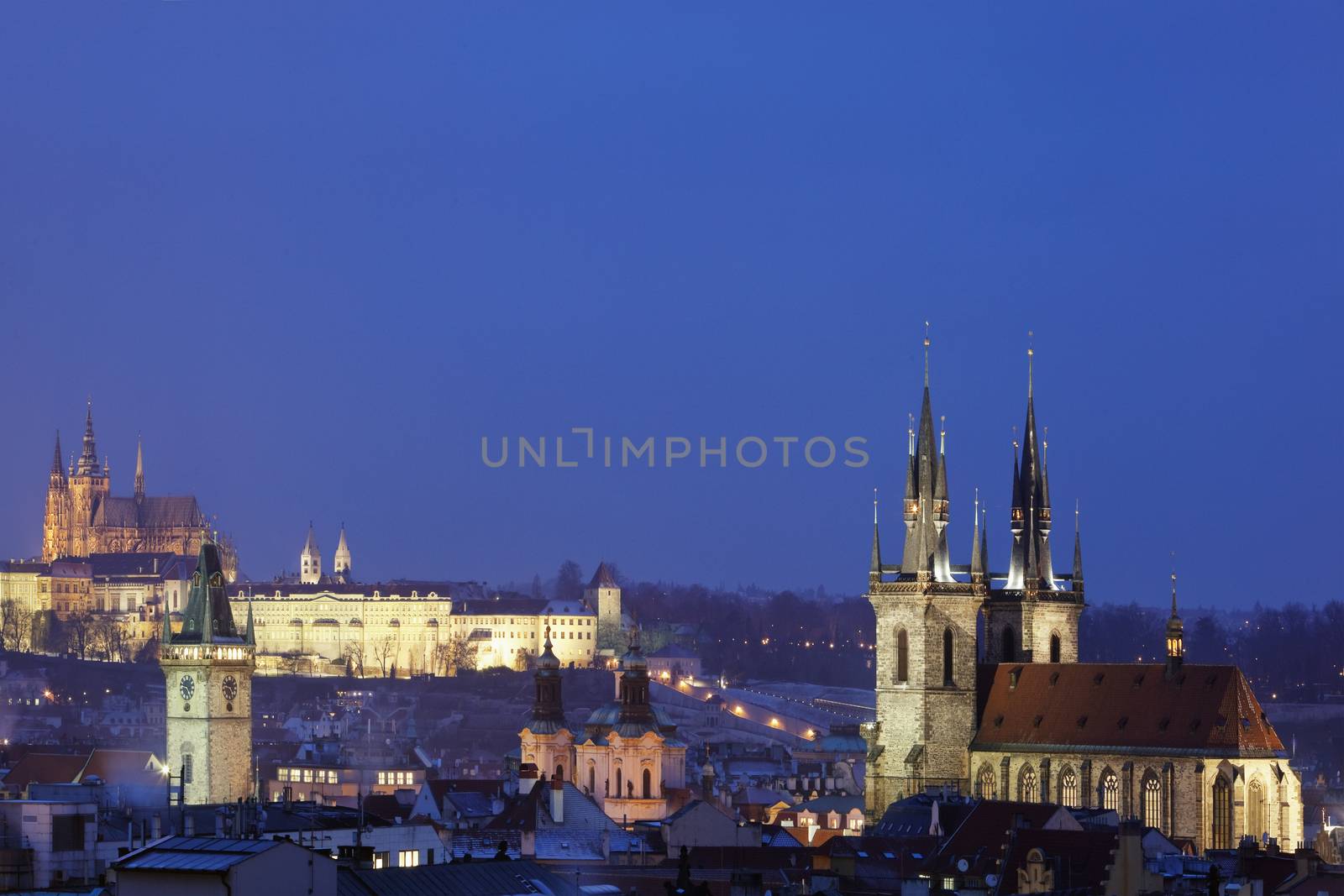 prague - spires of the old town and hradcany castle at dusk
