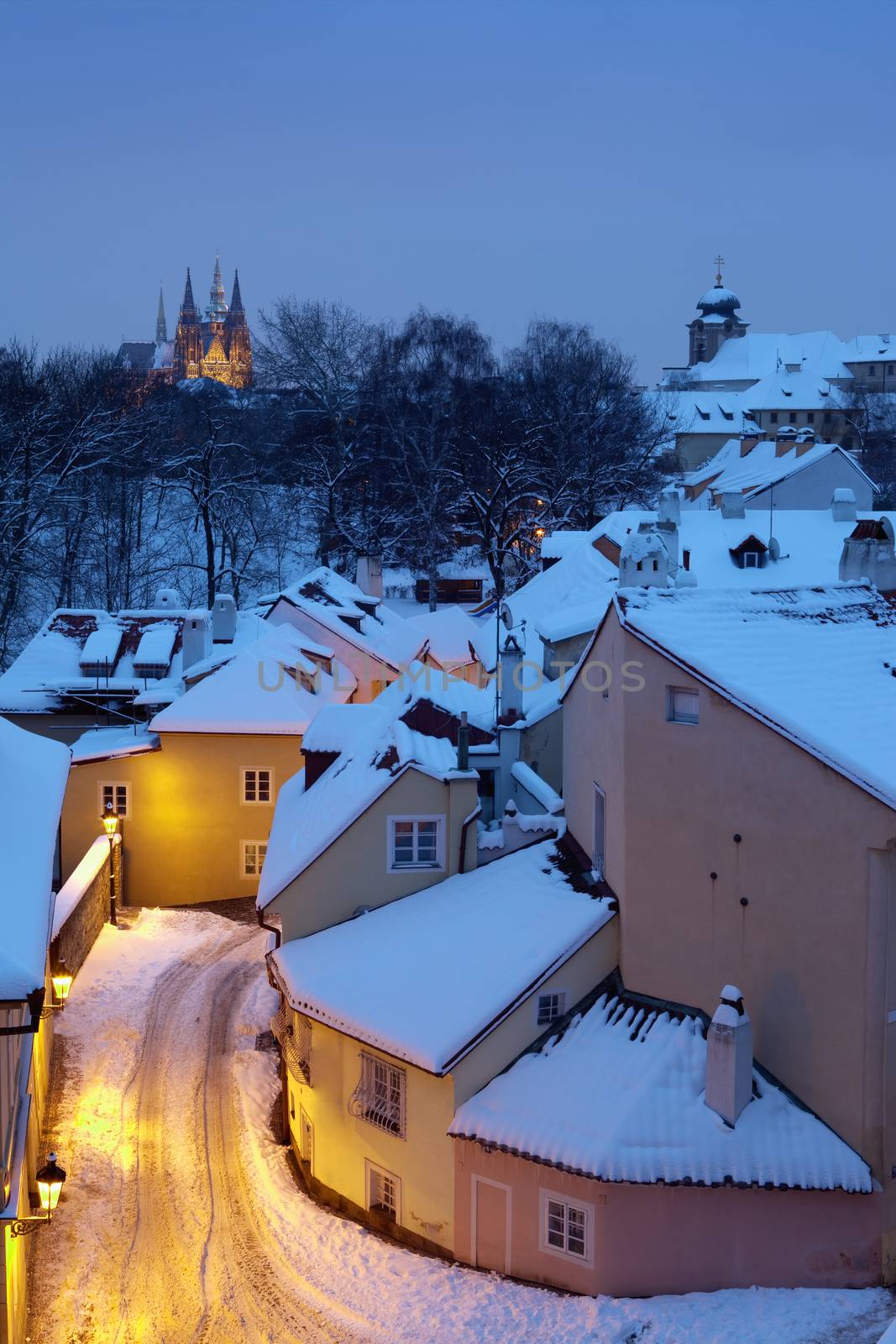 new world - picturesque quarters near hradcany castle at dusk