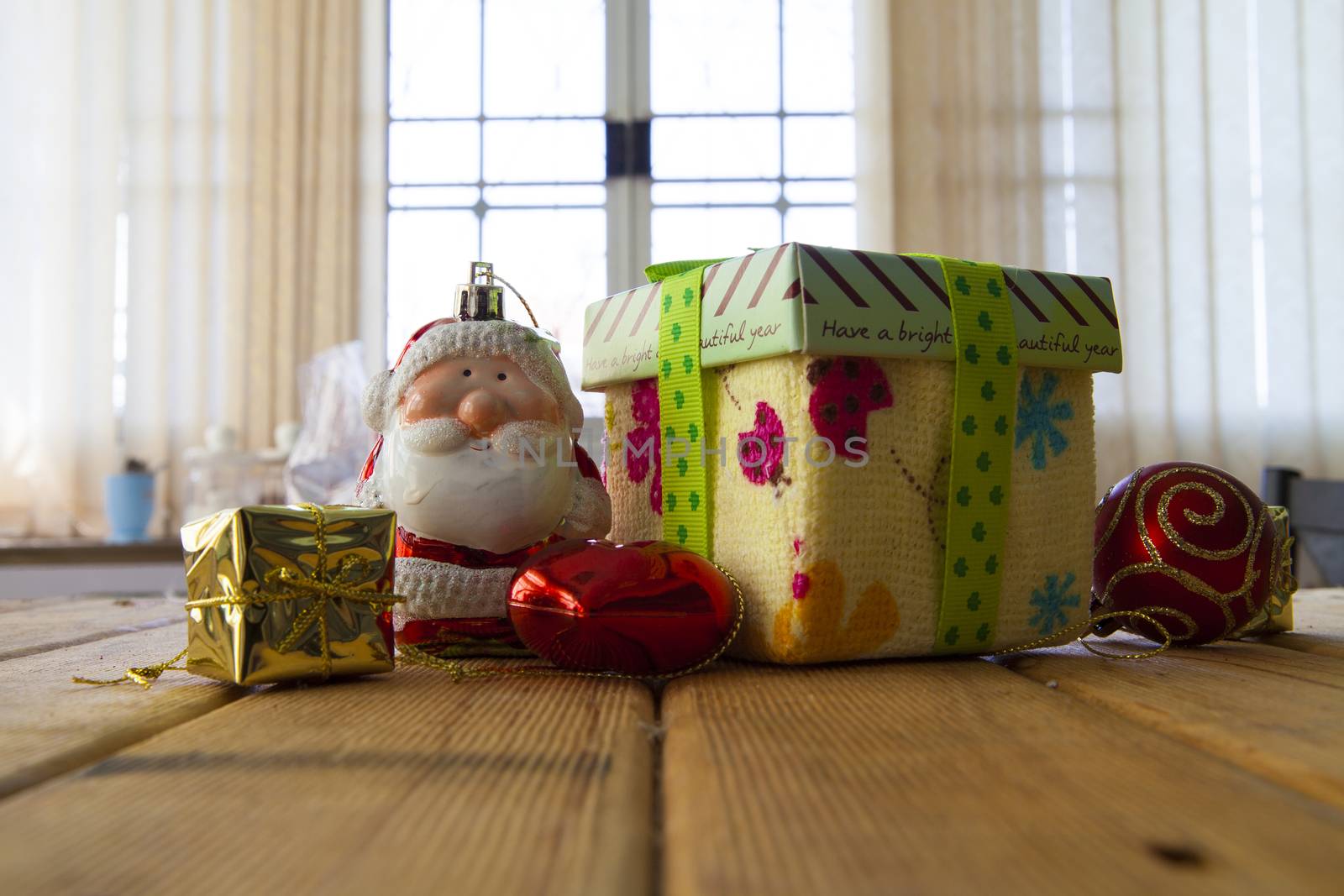 Wooden rustic background with  christmas presents.