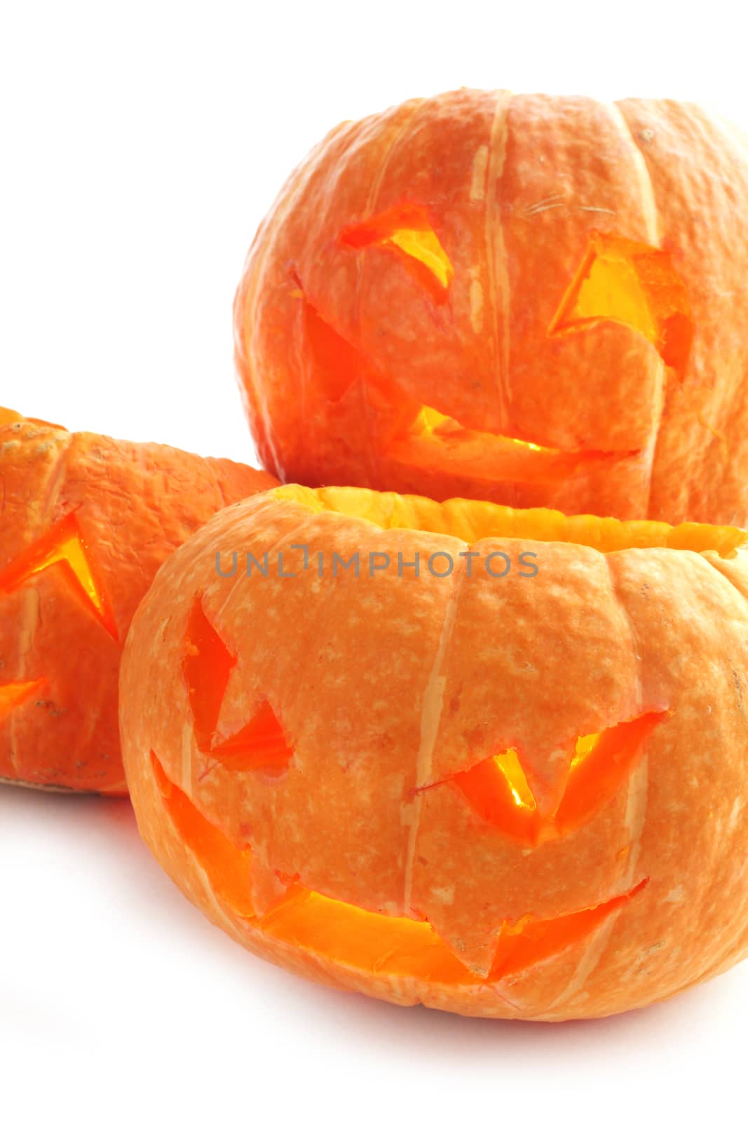 Glowing Halloween Pumpkins isolated on white background