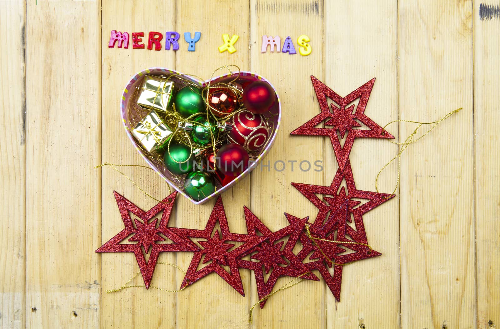 Christmas garland on rustic wood with copy space
