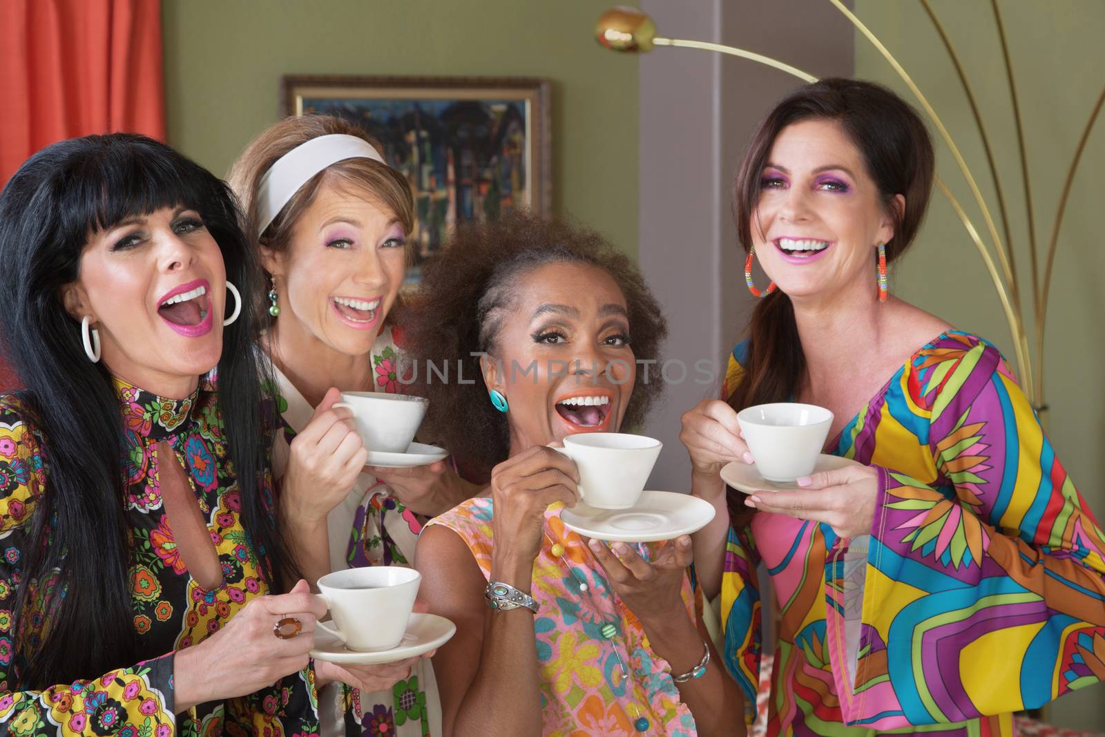 Laughing group of four women in retro style