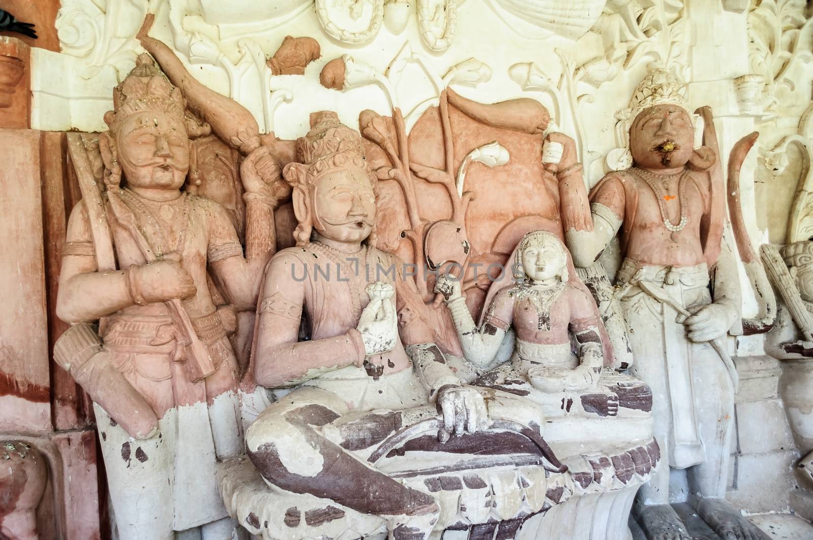 Ancient stone curved sculptures of Hindu Gods and godess
