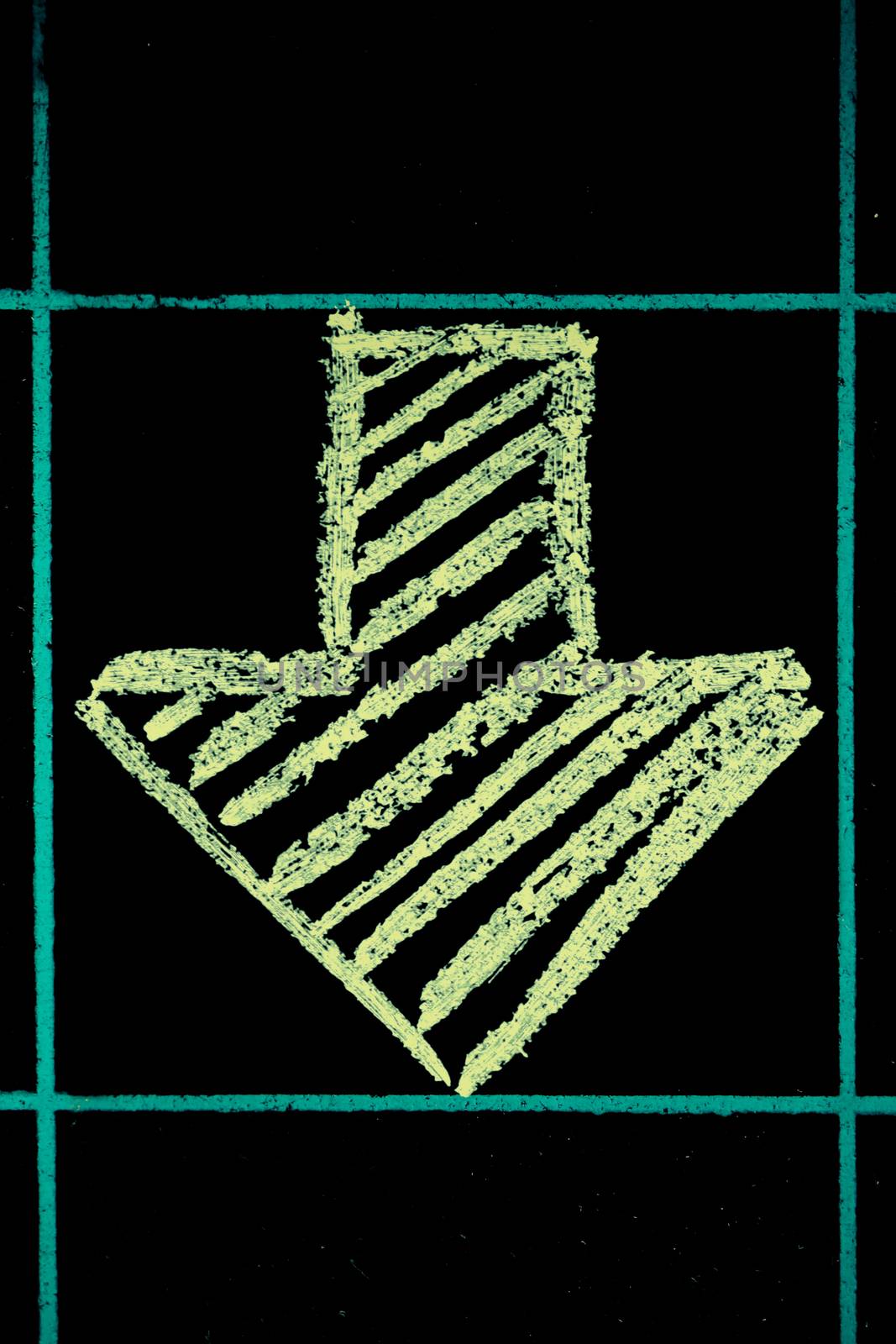 down side arrow sign handwritten on black chalkboard