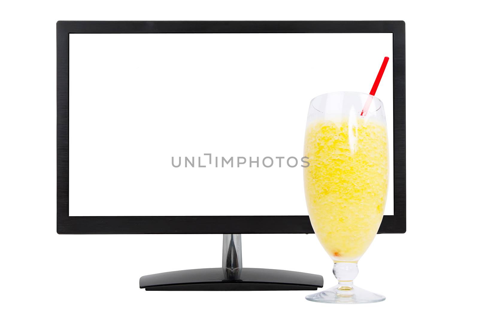 computer monitor and fresh juice isolated on white background