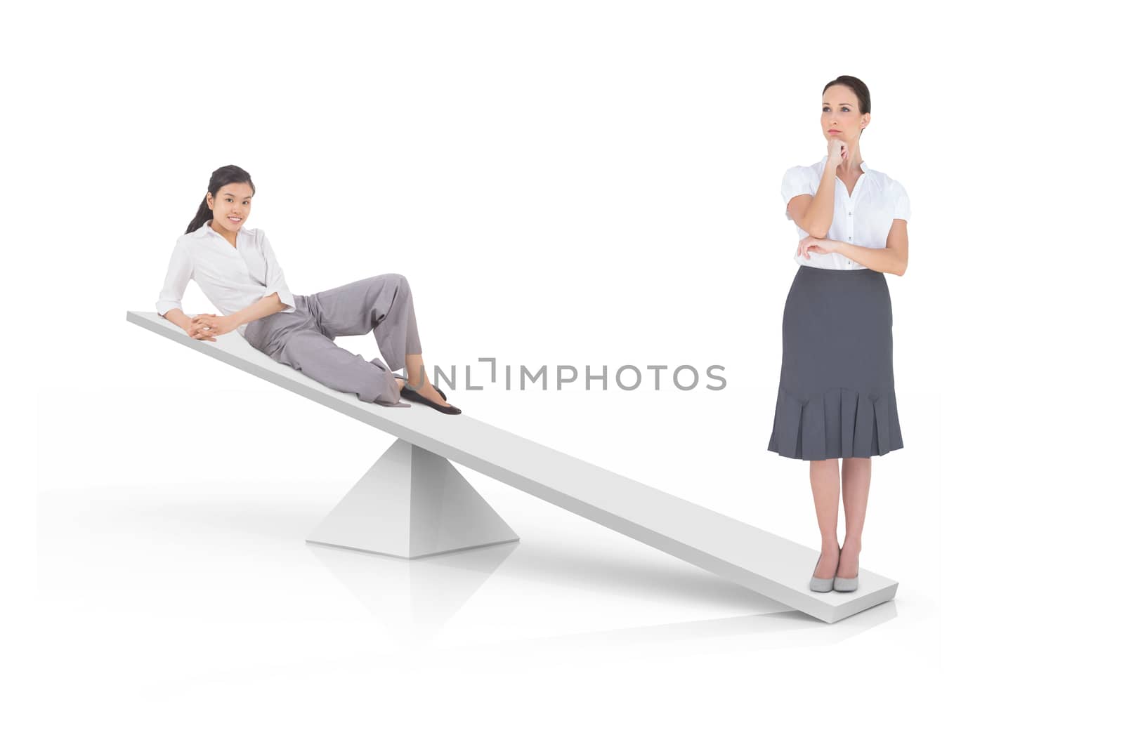 White scales measuring businesswomen on white background