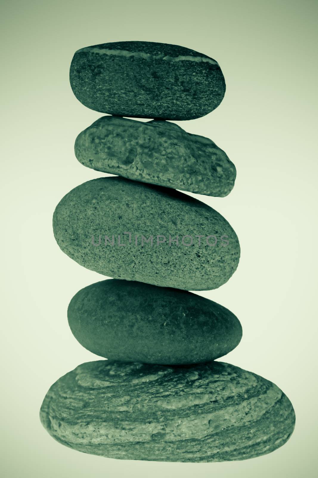 Five stones balanced on top of eachother