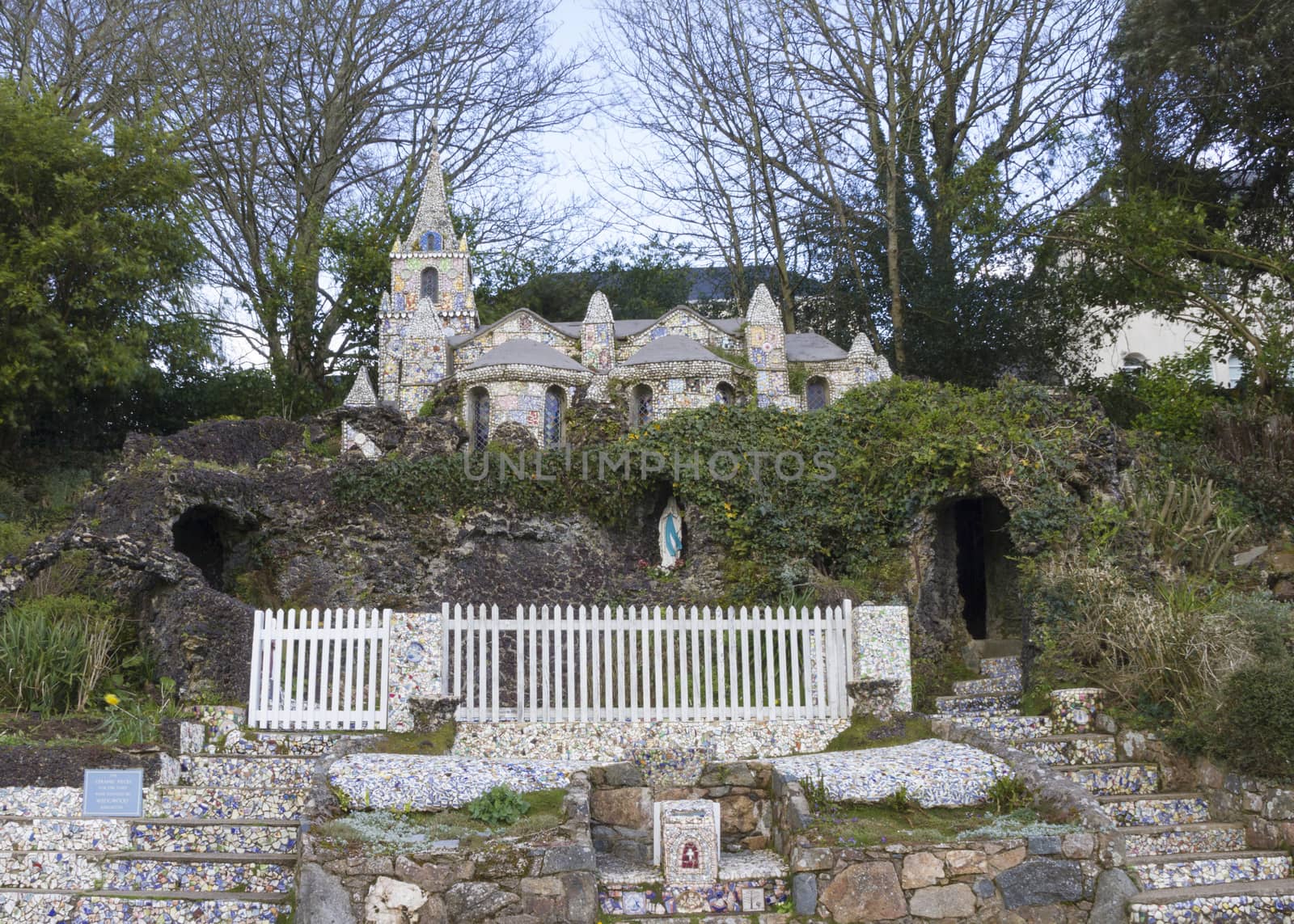 Little Chapel (Brother Deodat, 1914) in Saint Peter Port is possibly the smallest chapel in the world - miniature version of famous grotto
 and basilica at Lourdes in France. Guernsey, English Channel.