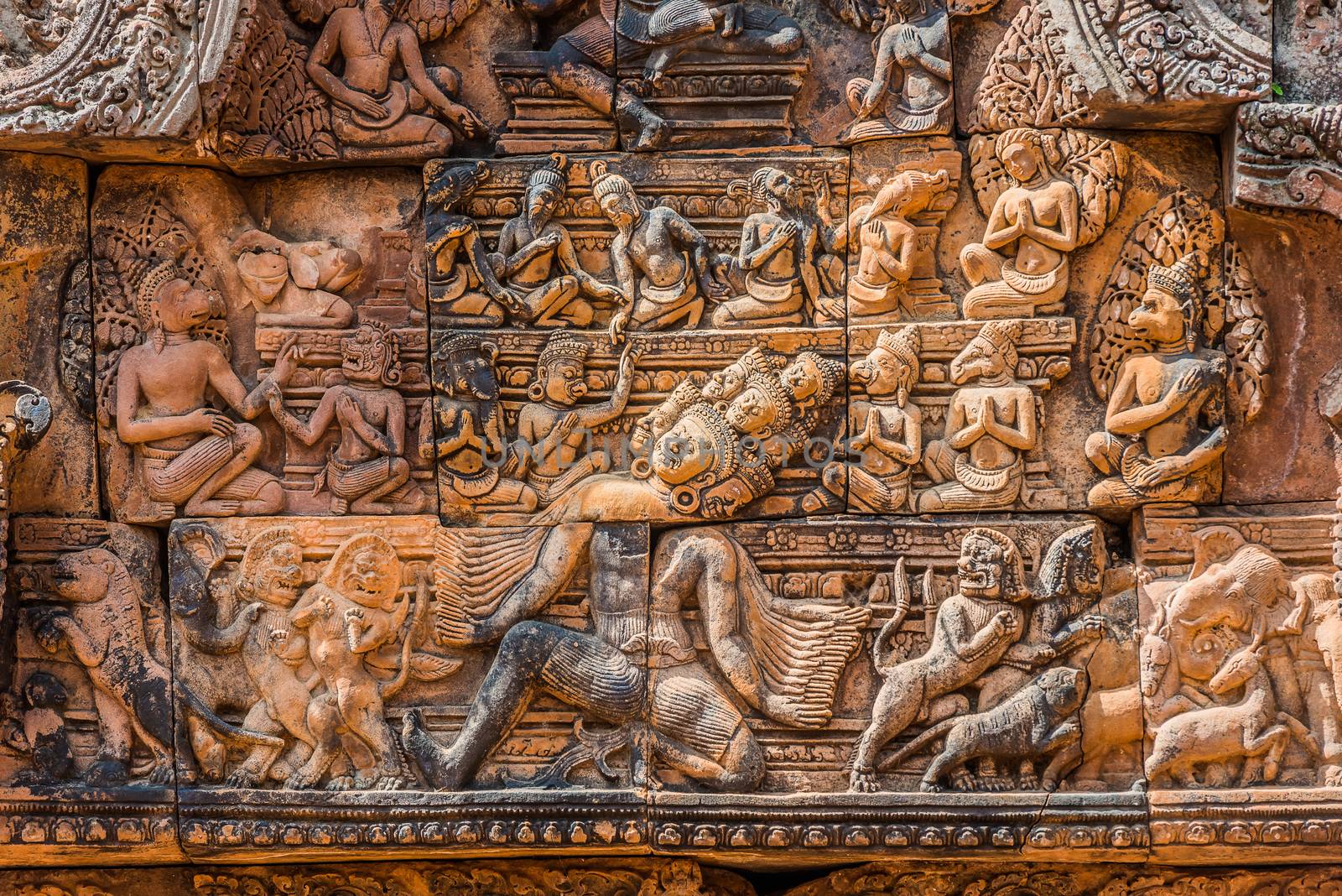 lintel carving of Ravana god at Banteay Srei hindu pink temple Cambodia