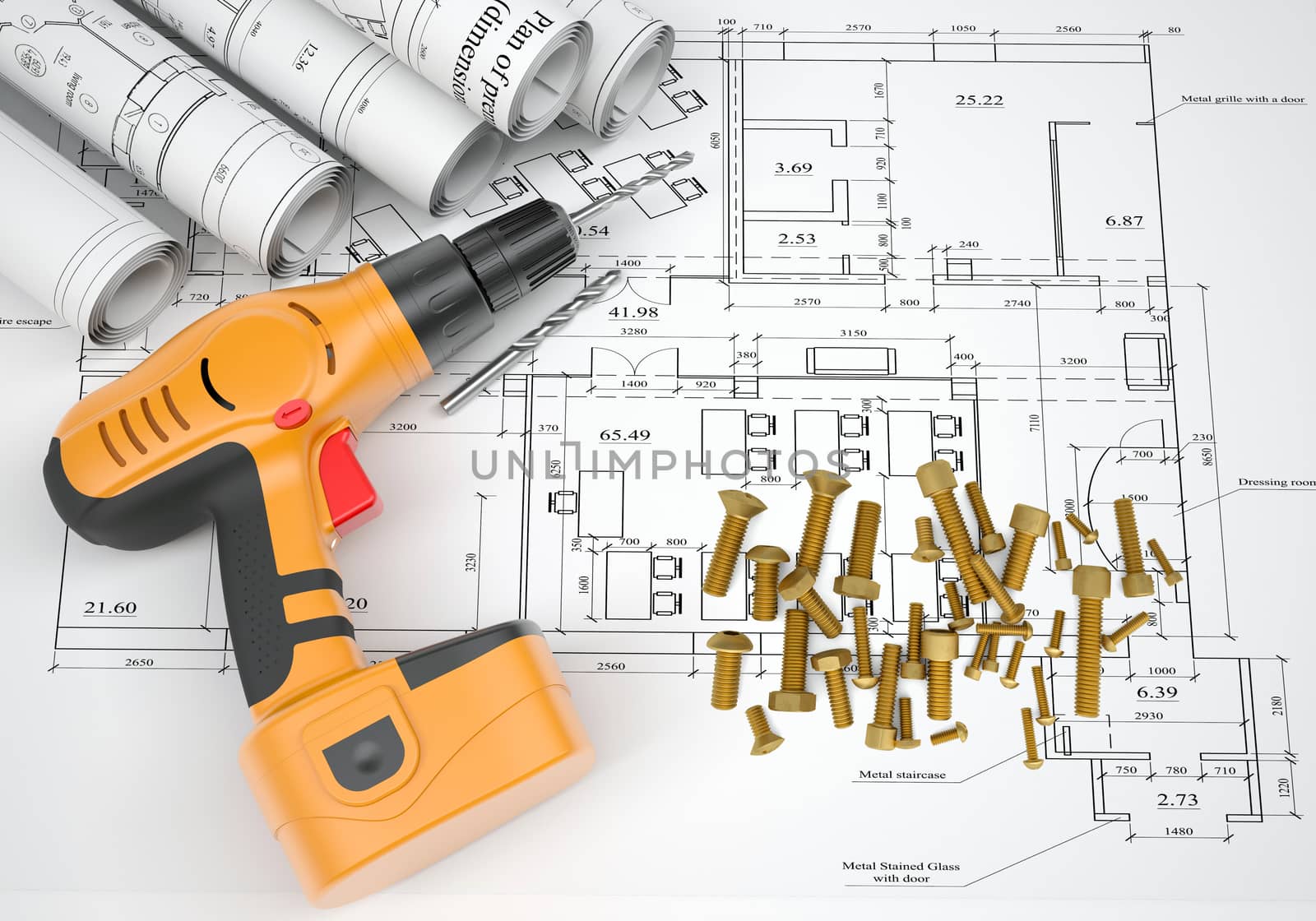 Electric screwdriver, fastening hardware, borers and scrolled drafts on spread architectural drawing.  Construction business concept.