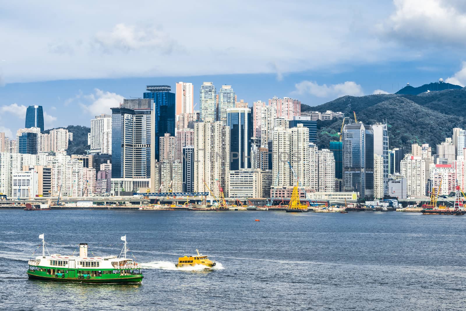 Central skyline waterfront Causeway Bay Hong Kong  by PIXSTILL