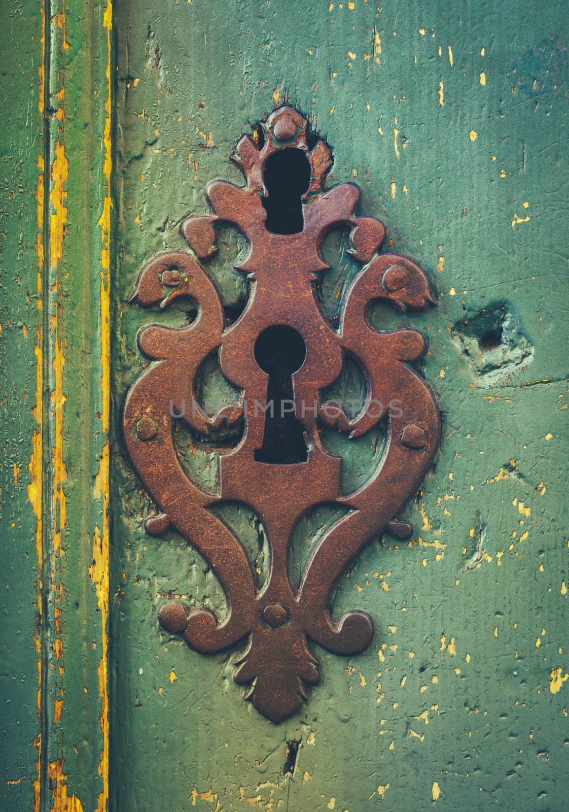 Vintage Ornamental Keyhole On A Rustic Old Door In Toulouse France