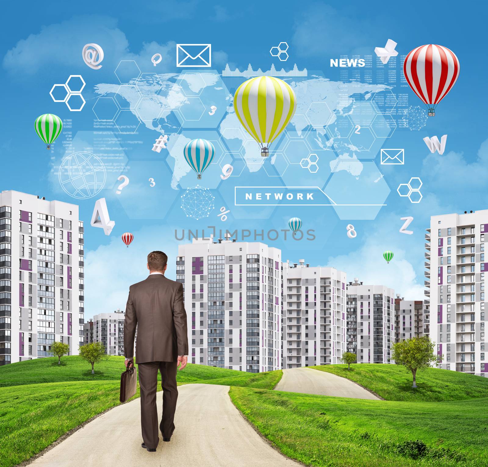 Businessman walking along road running through green hills with a few trees. High-rise buildings with a few air-baloons above as backdrop. Charts, hexagons and other virtual items in sky.