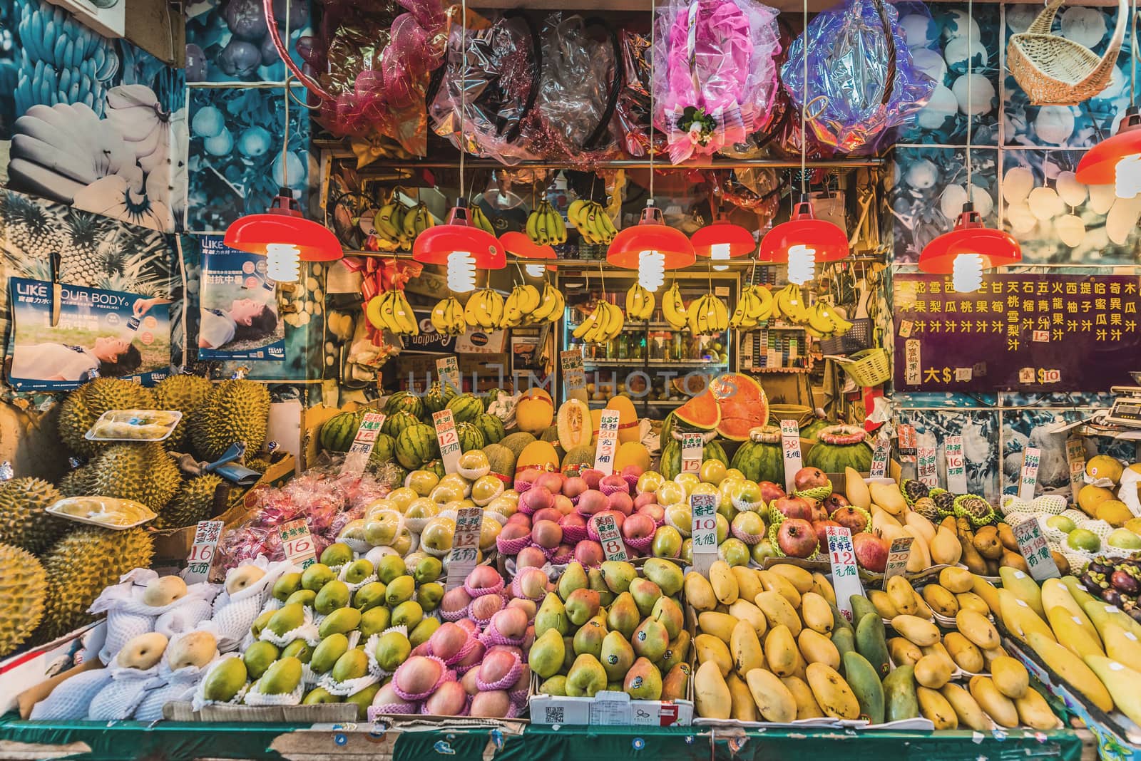 tropical fruit market stand Causeway Bay Hong Kong  by PIXSTILL
