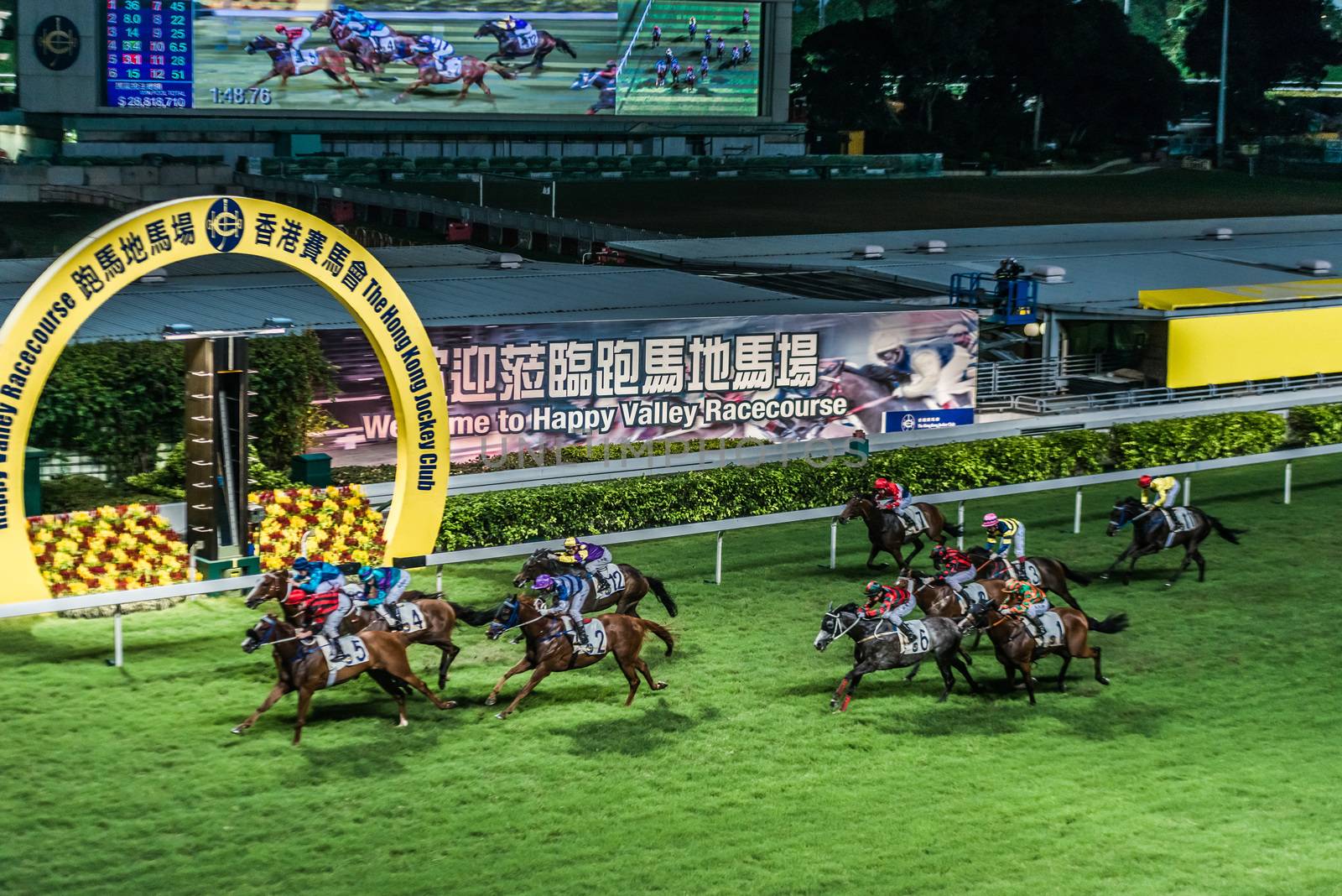 Happy Valley, Hong Kong, China - June 5, 2014: horse race at Happy Valley racecourse
