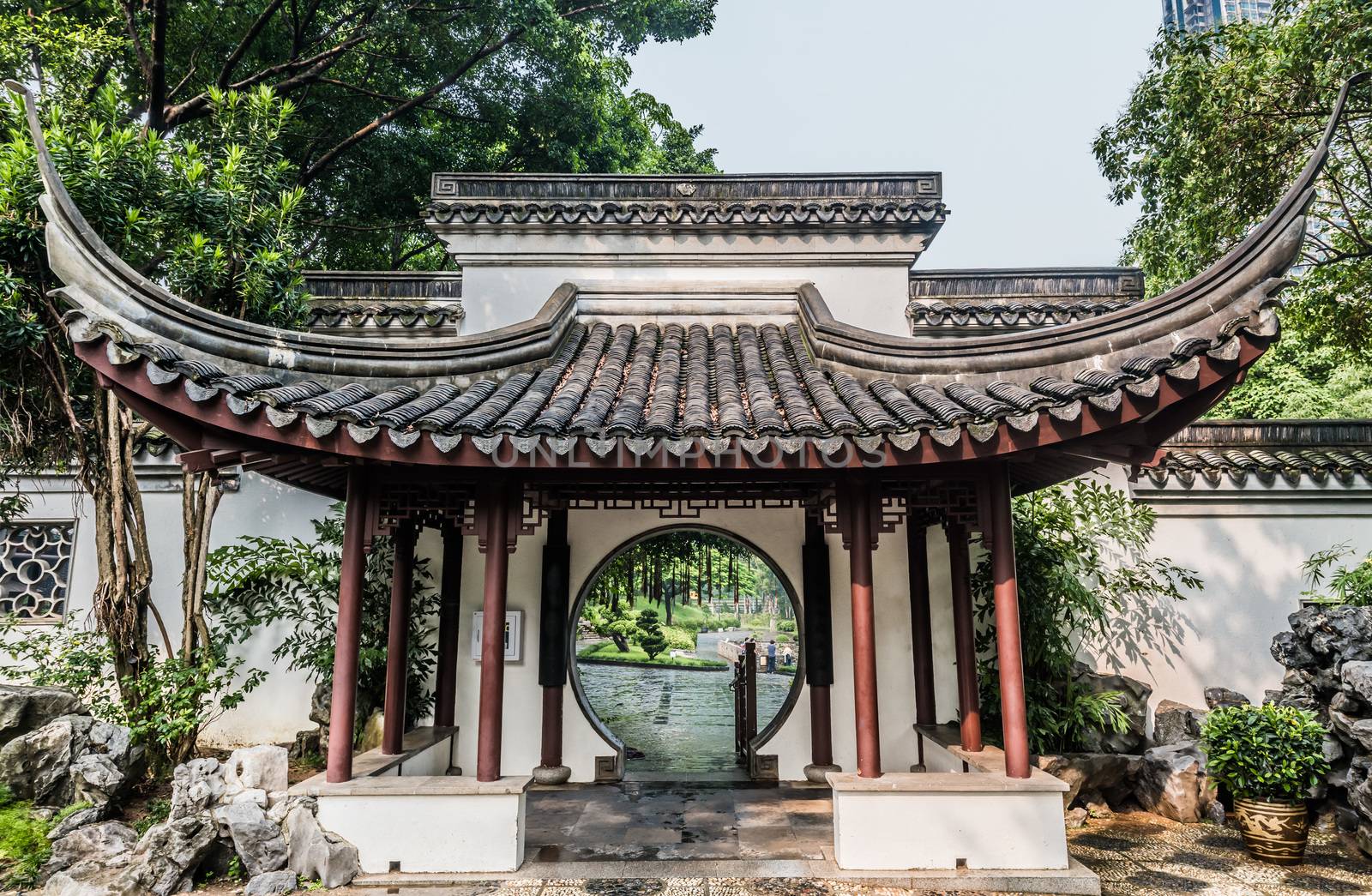 round gate Kowloon Walled City Park Hong Kong  by PIXSTILL