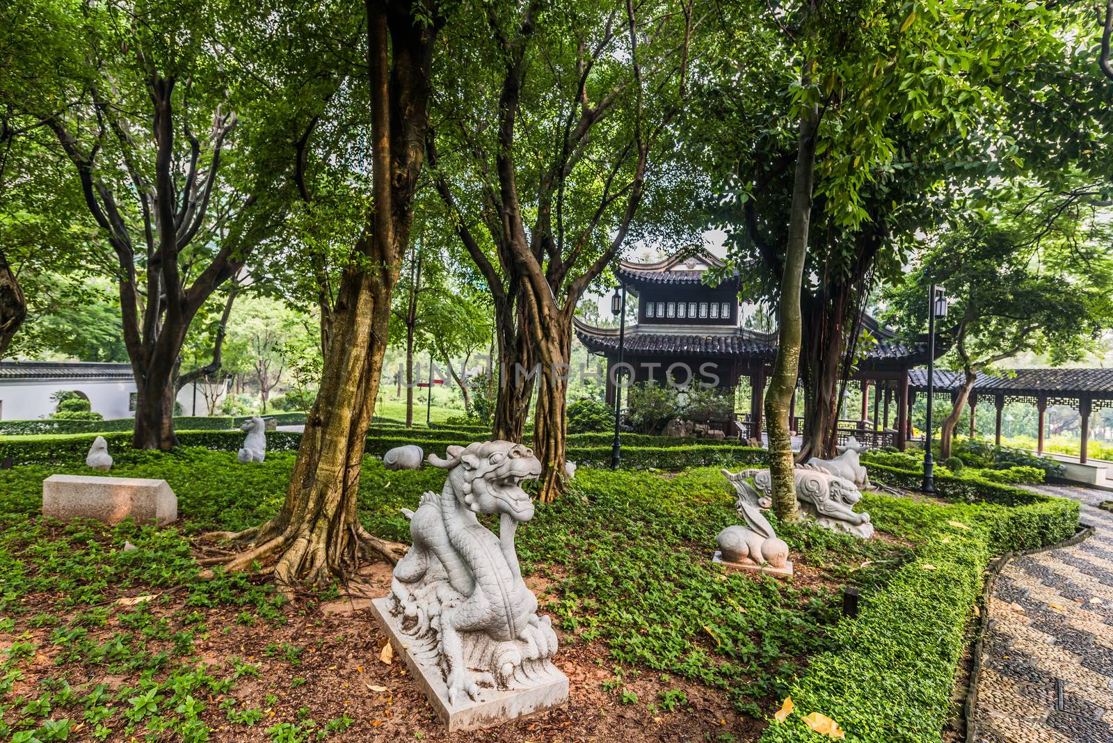 Chinese Zodiac garden statues Kowloon Walled City Park Hong Kong by PIXSTILL