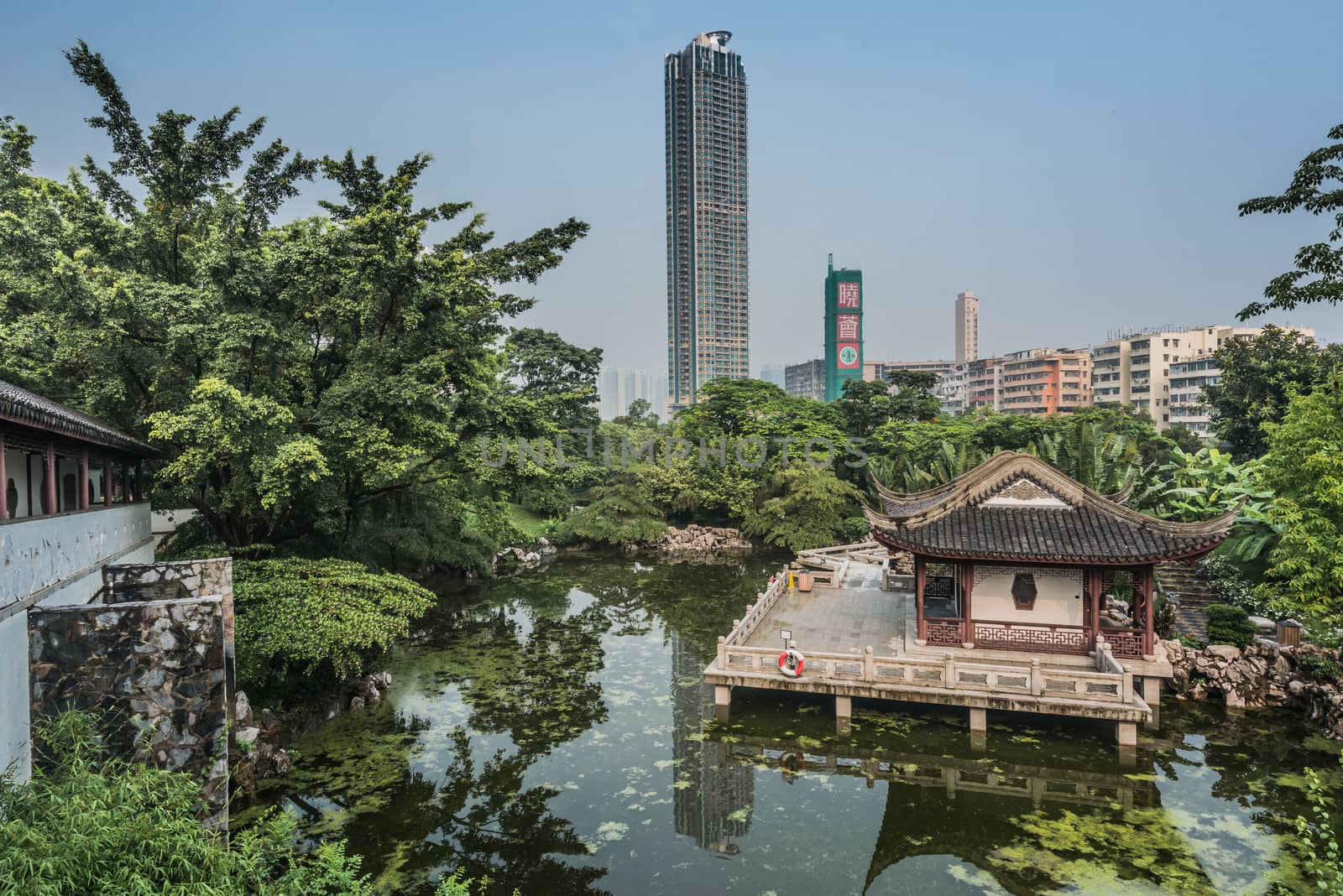 pagoda temple pond Kowloon Walled City Park Hong Kong  by PIXSTILL