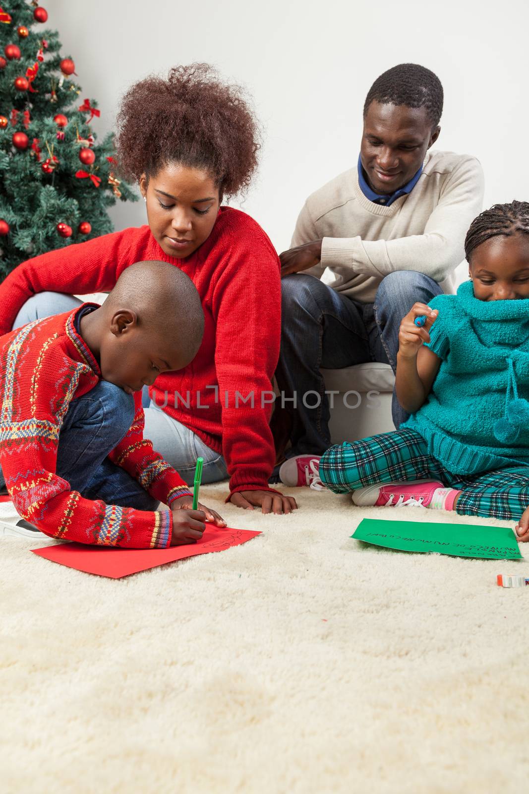 30-35, 4-6, african, apartment, black, boy, celebration, child, childhood, children, christmas, daughter, family, female, festive, fun, girl, happy, home, homey, house, joyful, kid, leisure, letter, life, little, living, love, model, old, parent, people, person, property, releases, room, santa, sitting, smiling, think, thinking, tree, vertical, white, write, writing, xmas, years, young