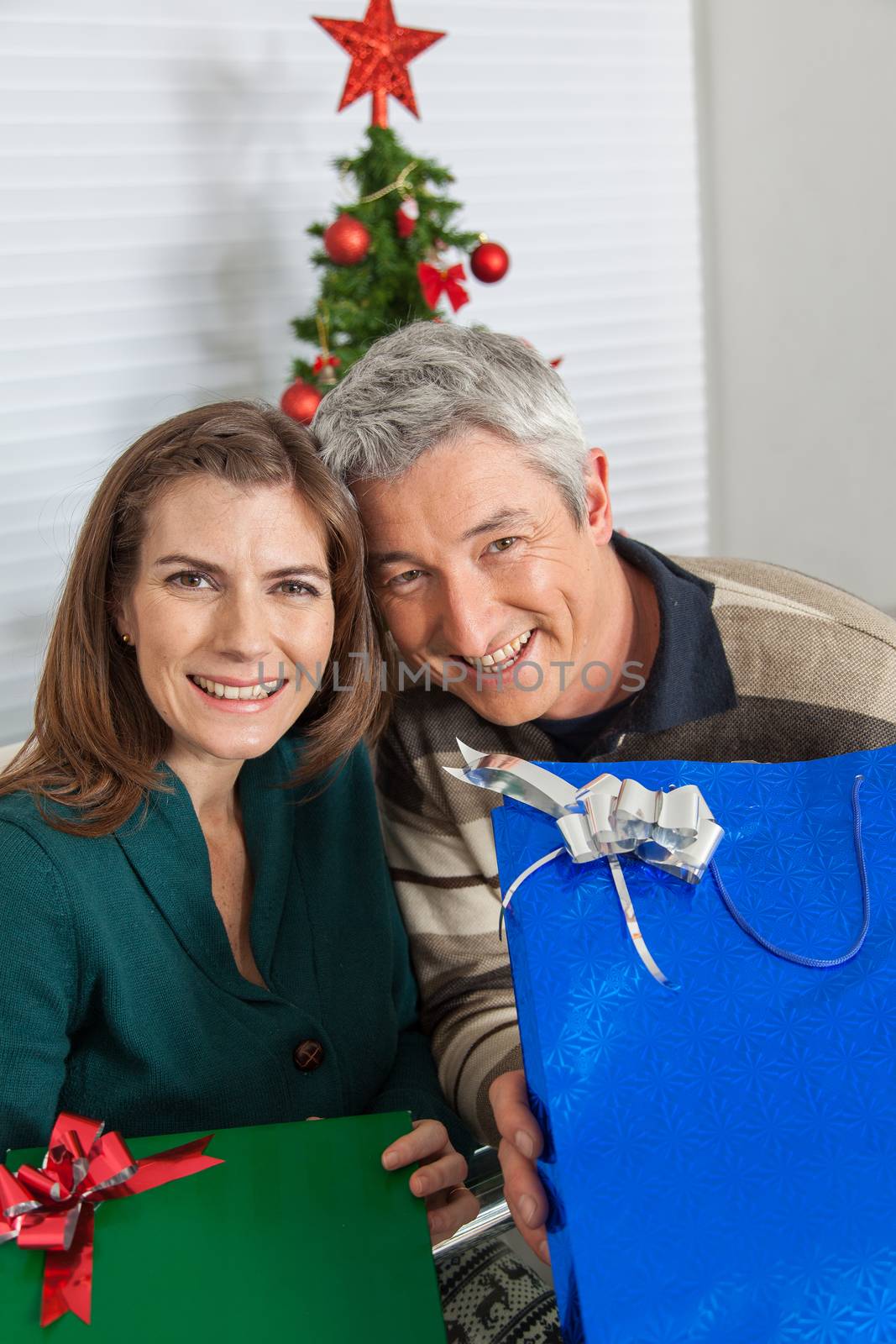 Man and woman with gifts by ifilms