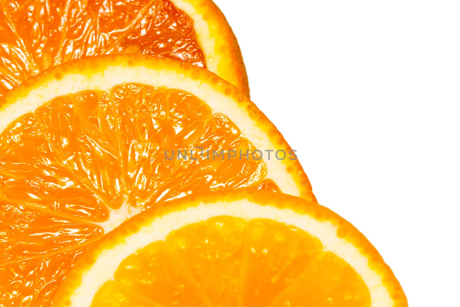 cutting orange. Three slices on a white background
