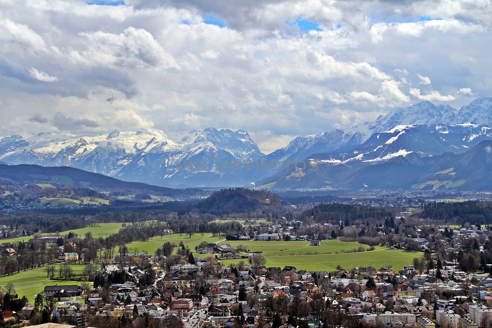 A stunning view from Salzburg castle. This city is surrounded by mountains with snow on top.