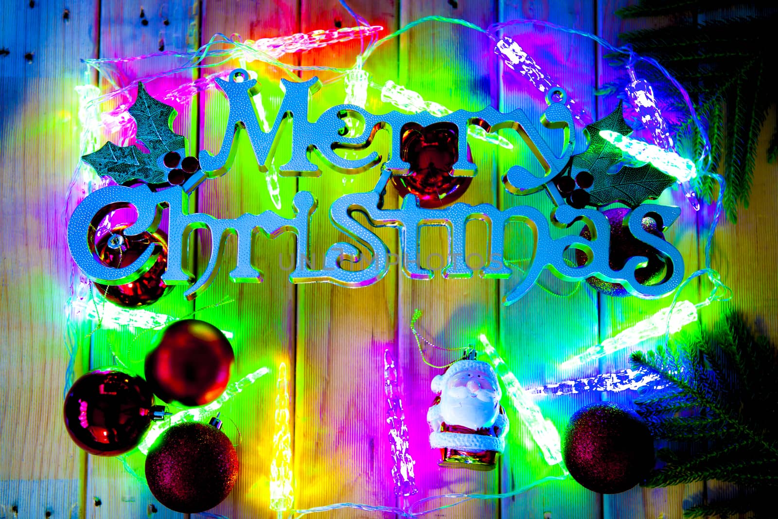 Christmas lights and Christmas Decoration on wooden background