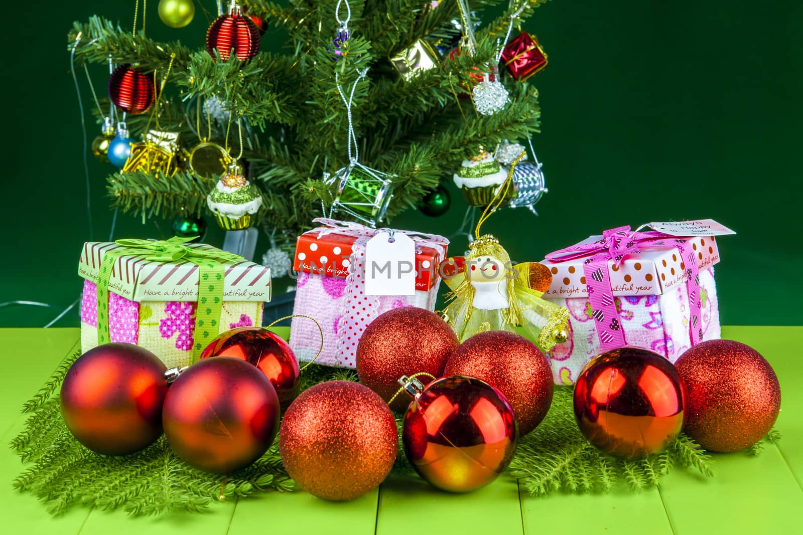 Christmas Decorations present with Christmas tree on background