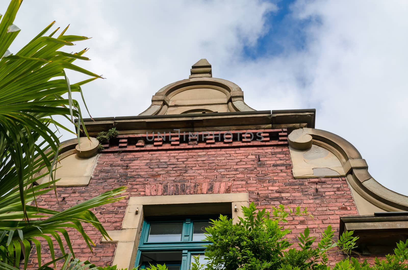 Gable view of a historic old town house brick.