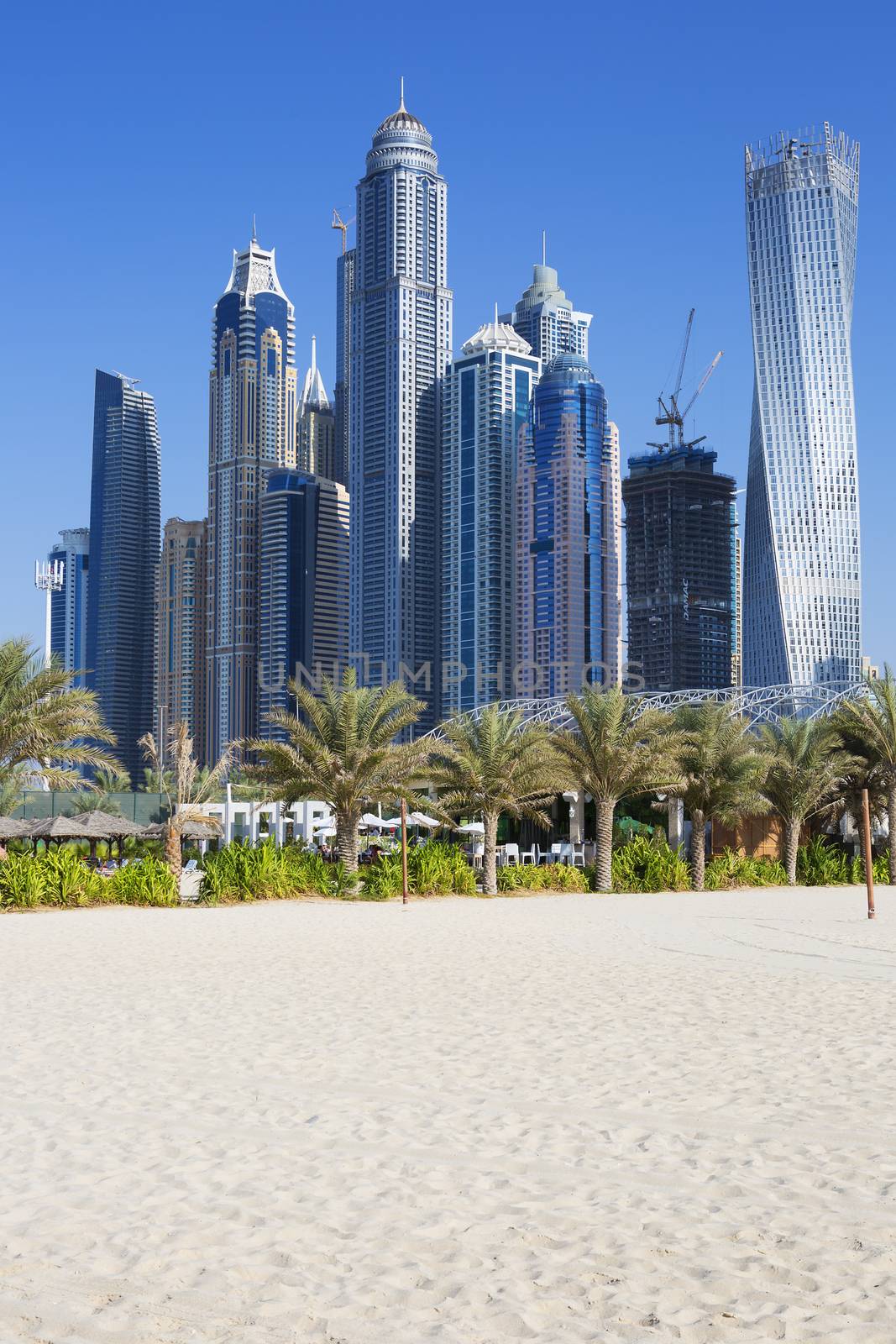 Skyscrapers and jumeirah beach in Dubai Marina. UAE 