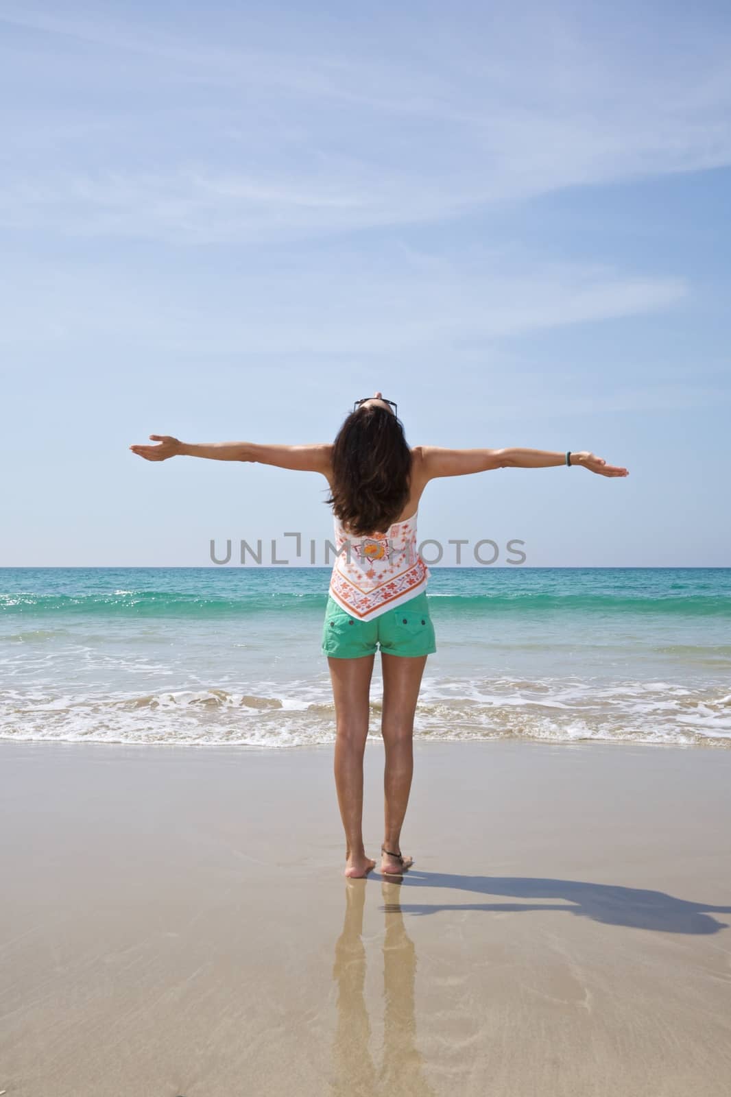 woman at sandy beach in Cadiz Andalusia Spain
