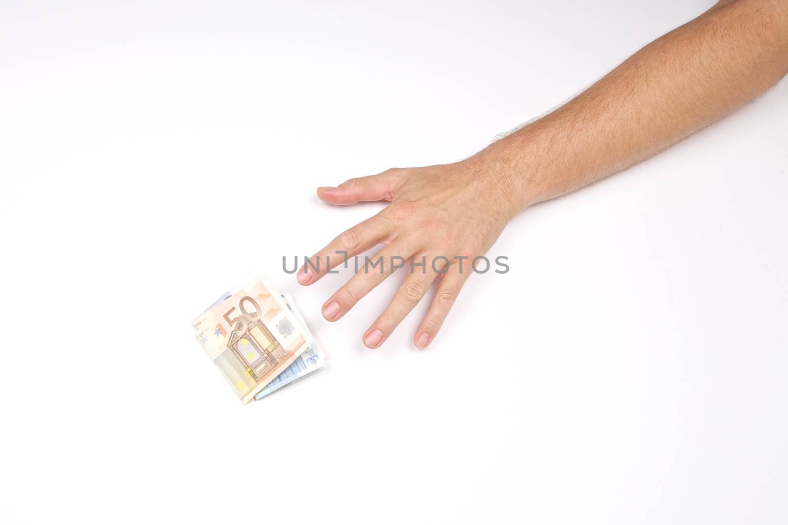 hand of man and wad of euros on white background