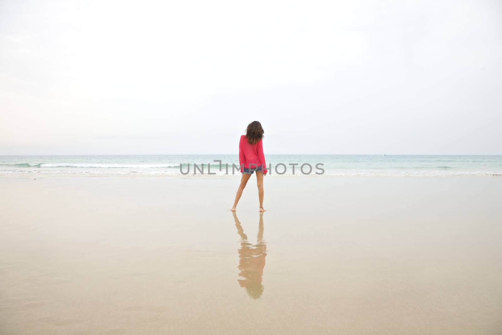 woman at sandy beach in Cadiz Andalusia Spain