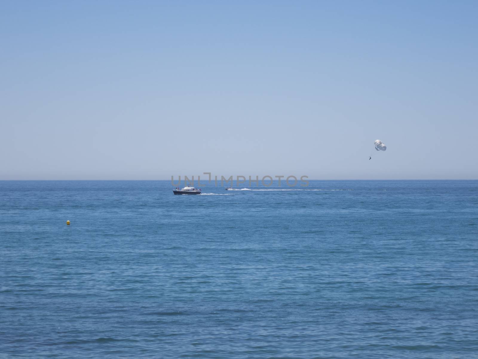 one speedboat parascending in Mediterranean Sea Spain