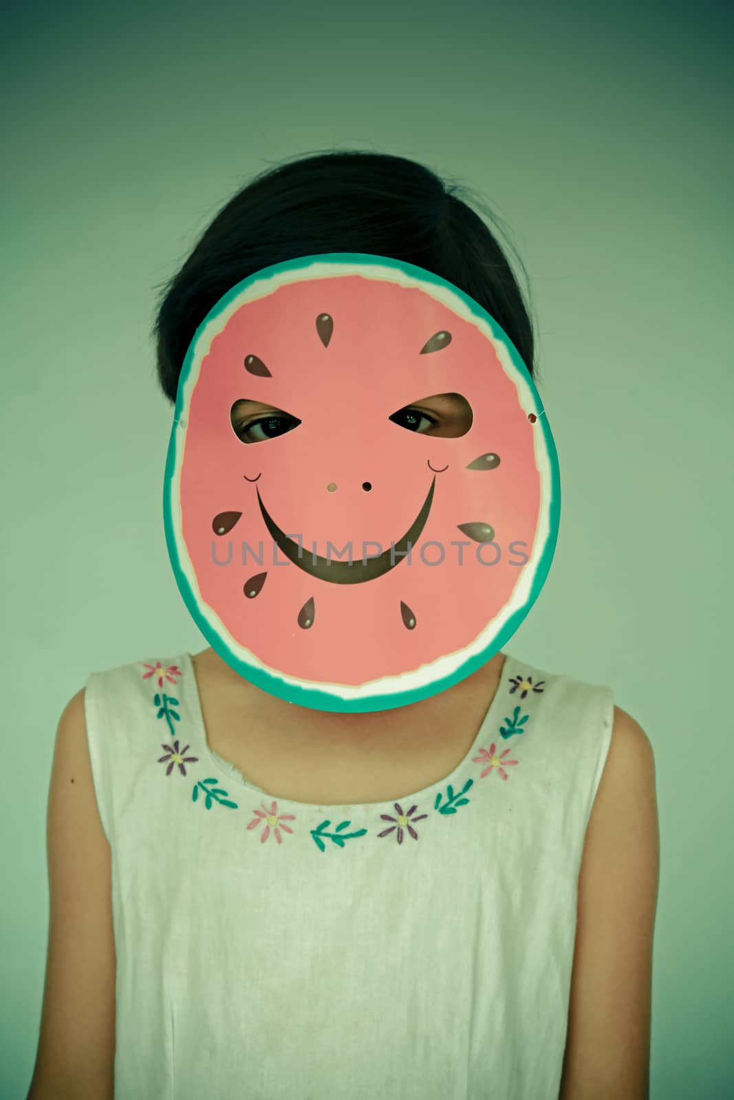 watermelon paper mask on girl face