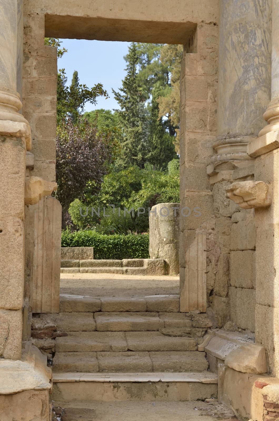 Gate to the gardens in  in the Roman Theatre of Merida. The theatre is located in the archaeological ensemble of Merida, one of the largest and most extensive archaeological sites in Spain.

