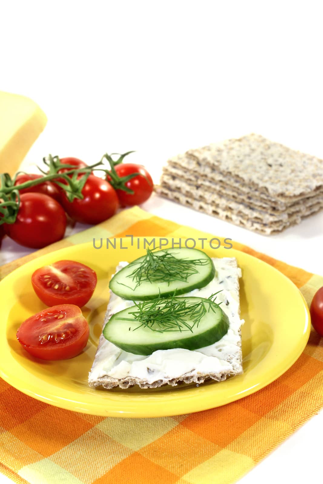 Crispbread with cream cheese and tomatoes by discovery